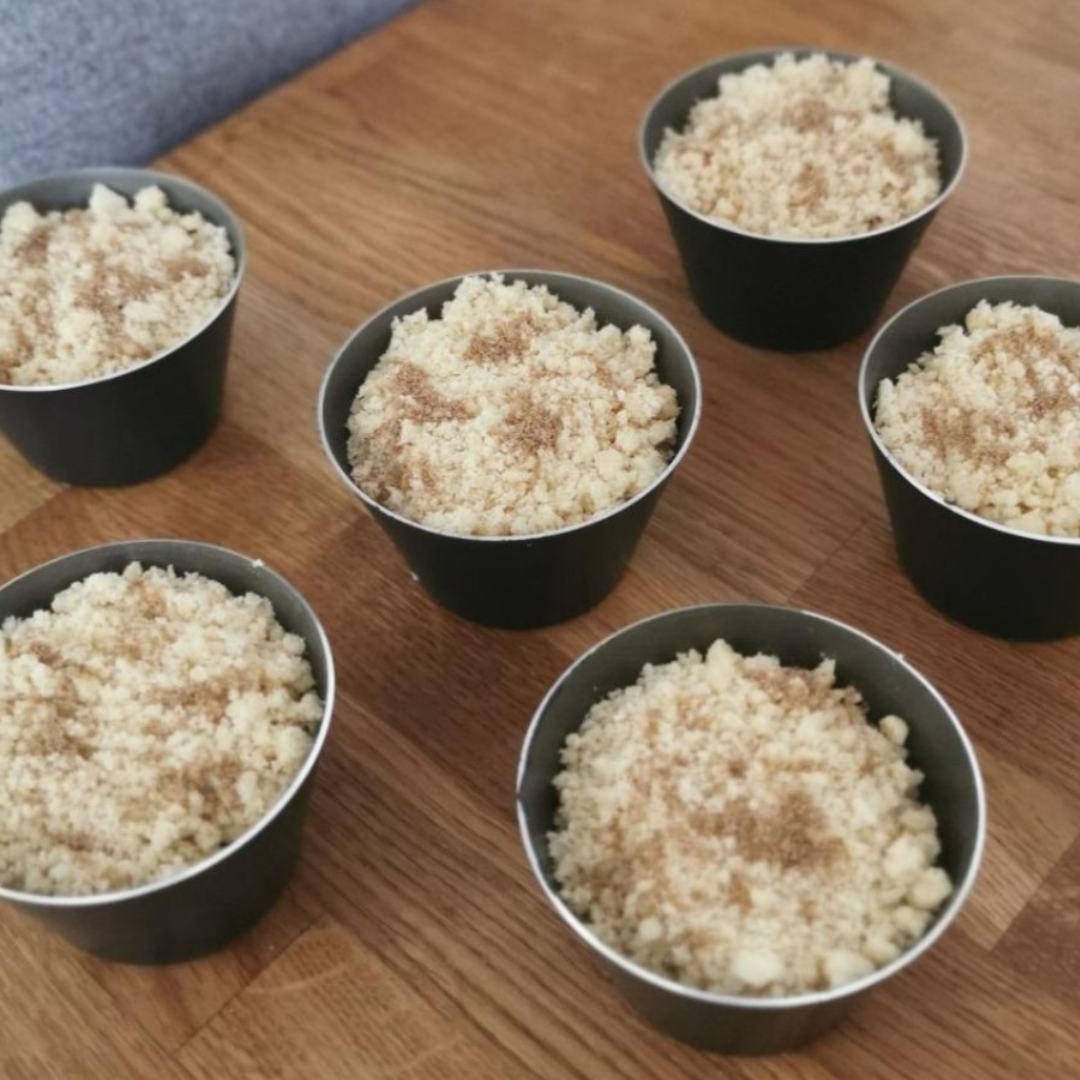 Apple crumble baked in aluminium dariole moulds